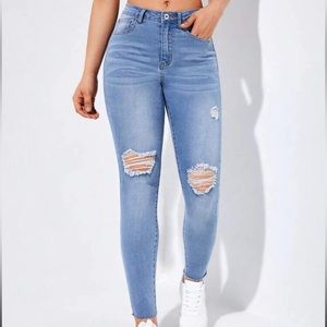 Women’s light wash ripped jeans denim new size 27